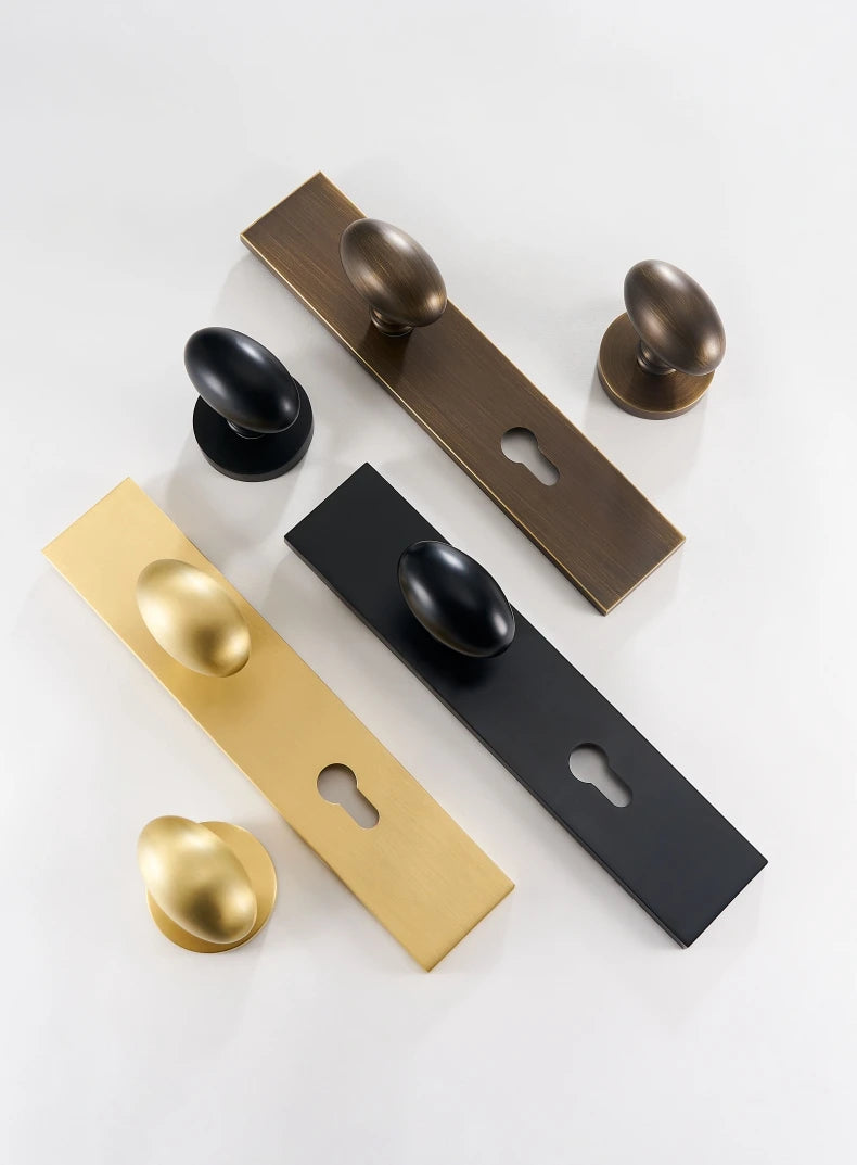 Black, bronze and brass door handles.