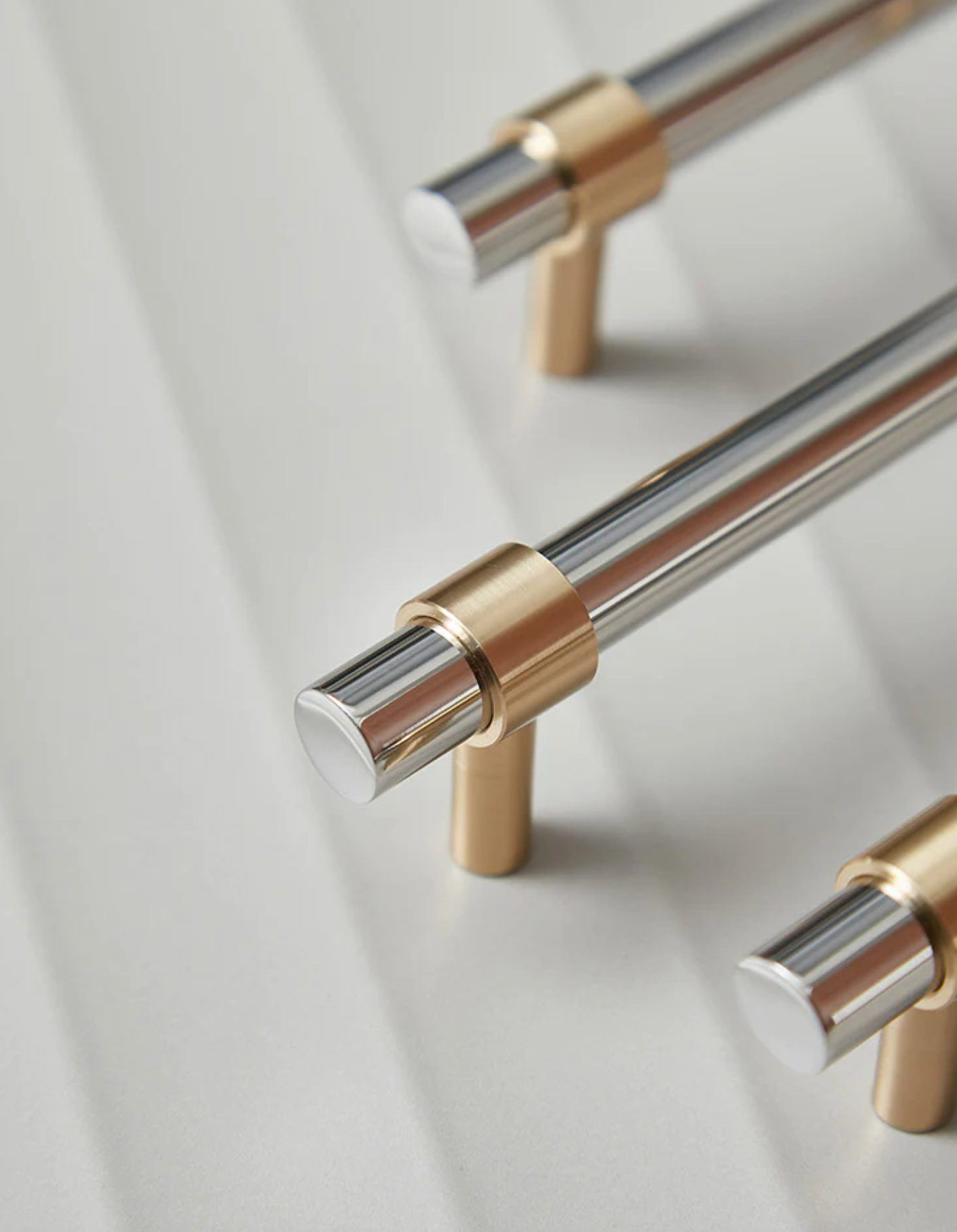 Silver and gold cabinet handles