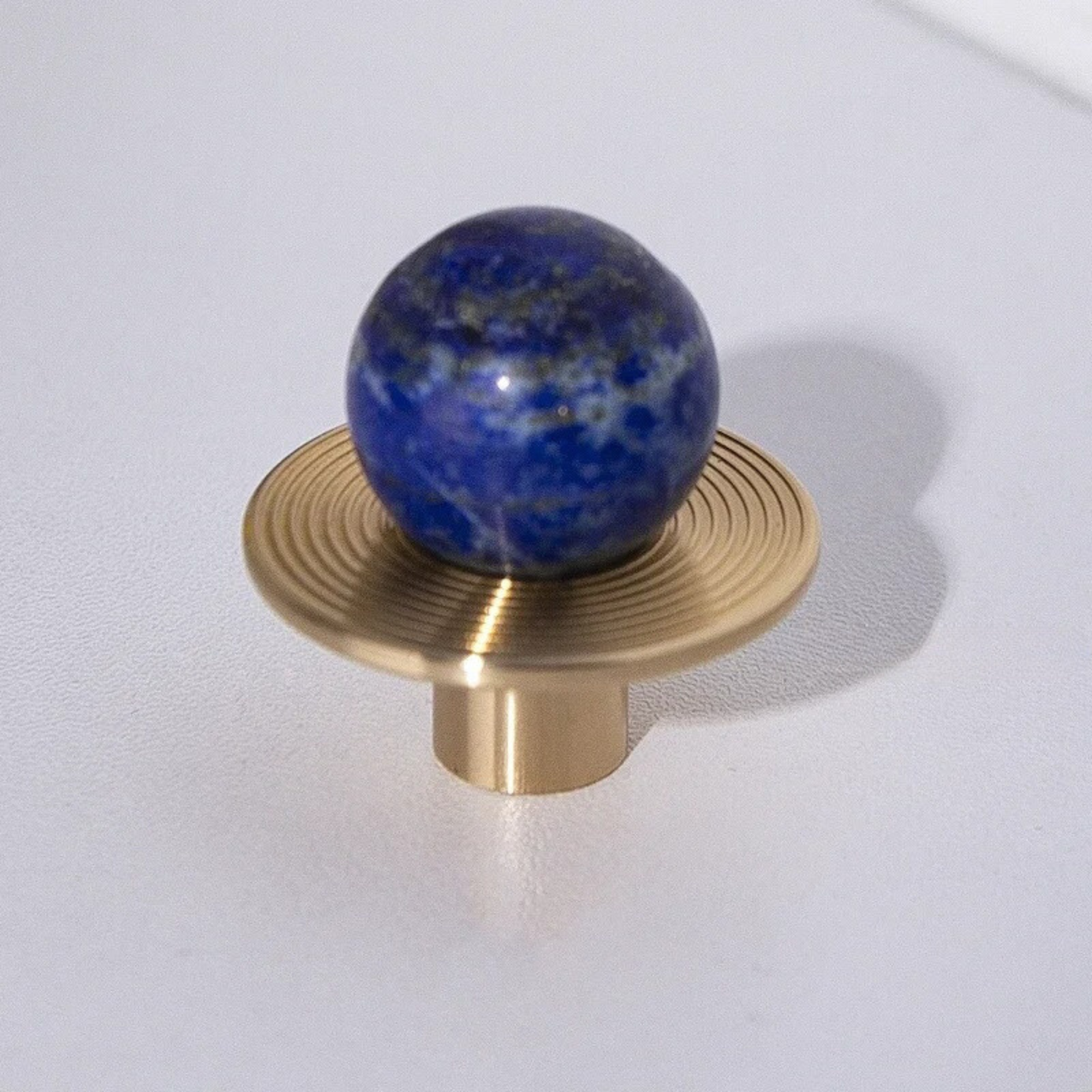 Stone and Brass Round Knobs | Nebula