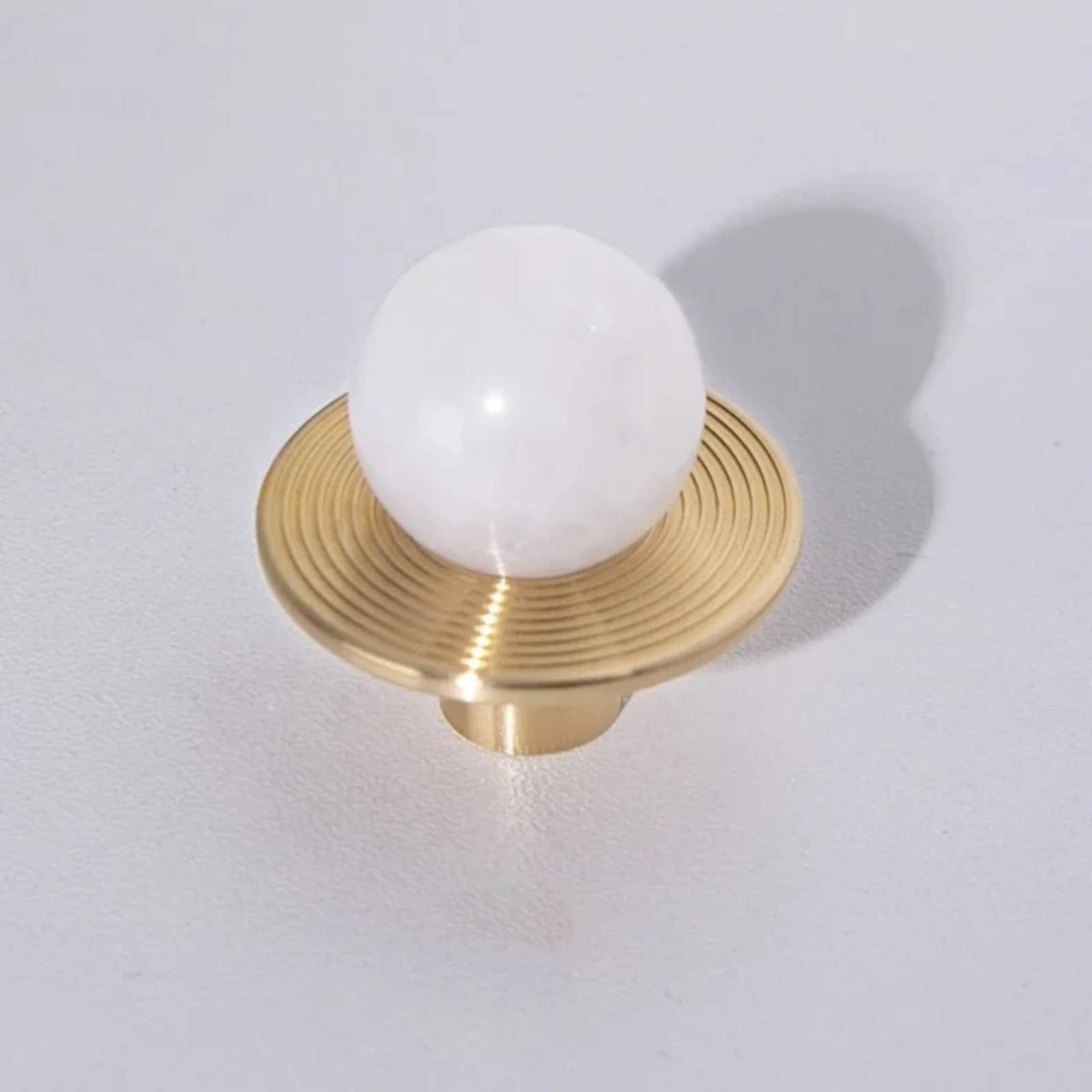 Stone and Brass Round Knobs | Nebula