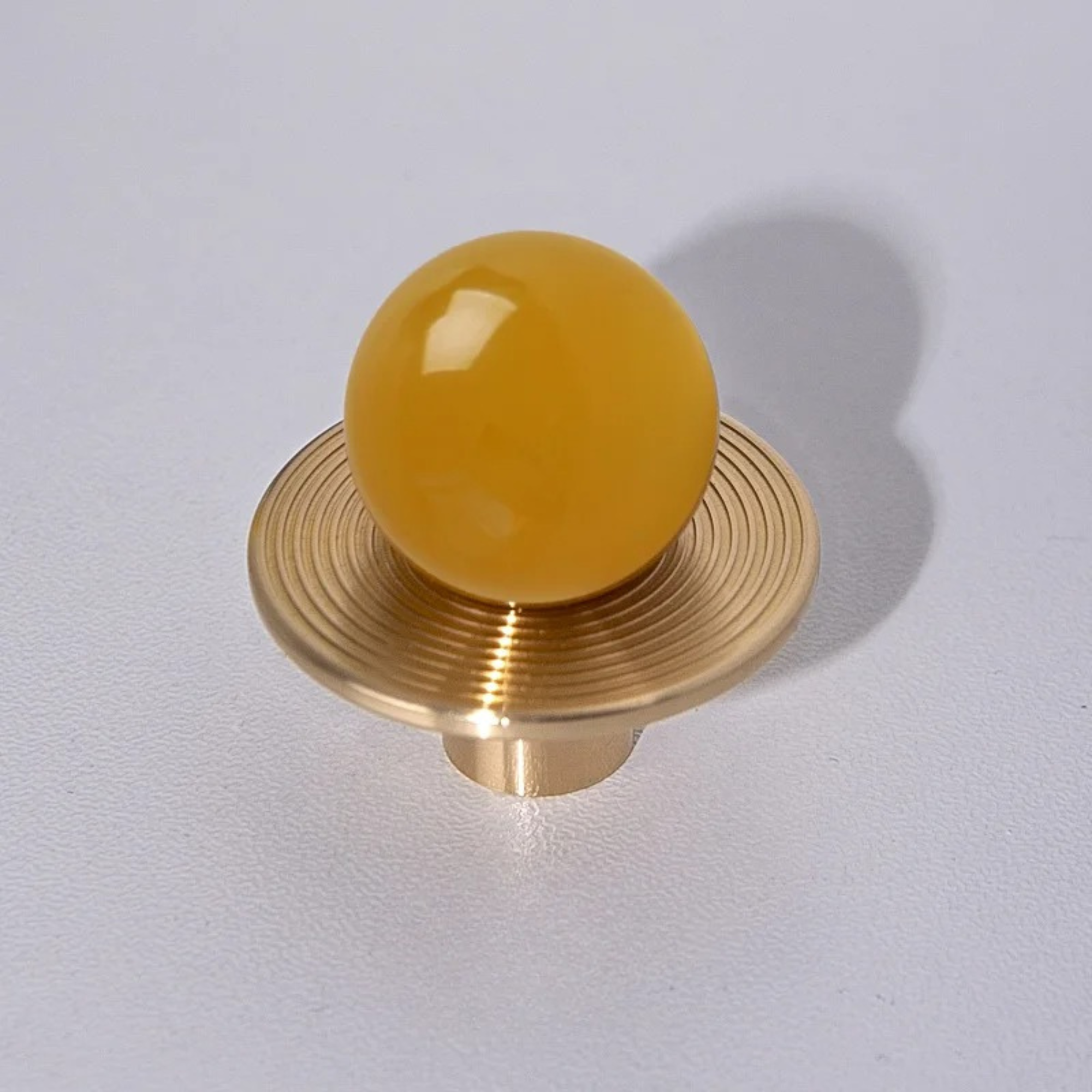 Stone and Brass Round Knobs | Nebula